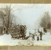Wood Seller (C.M. Fleck[?]) with his Sled in Winter